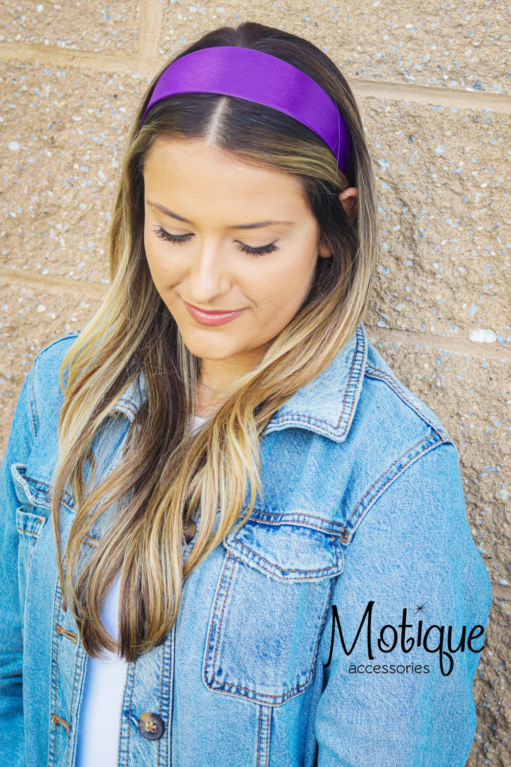 motique Accessories headband in use pulling hair back for polished look