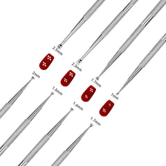 Mozeat Lens close-up of double-ended stainless steel tips showing smooth rounded ends