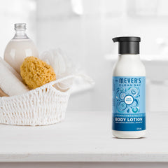 Mrs. MEYER'S bottle on bath ledge in lifestyle setting suggesting post-shower freshness