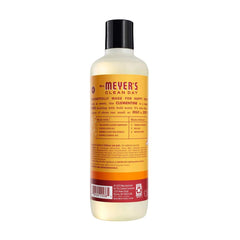 Close-up of Mrs. Meyer's pump dispensing citrus-scented gel highlighting gentle moisturizing texture