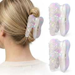 Mtiyoose front view of tooth-shaped clip pair showing playful design and secure hold