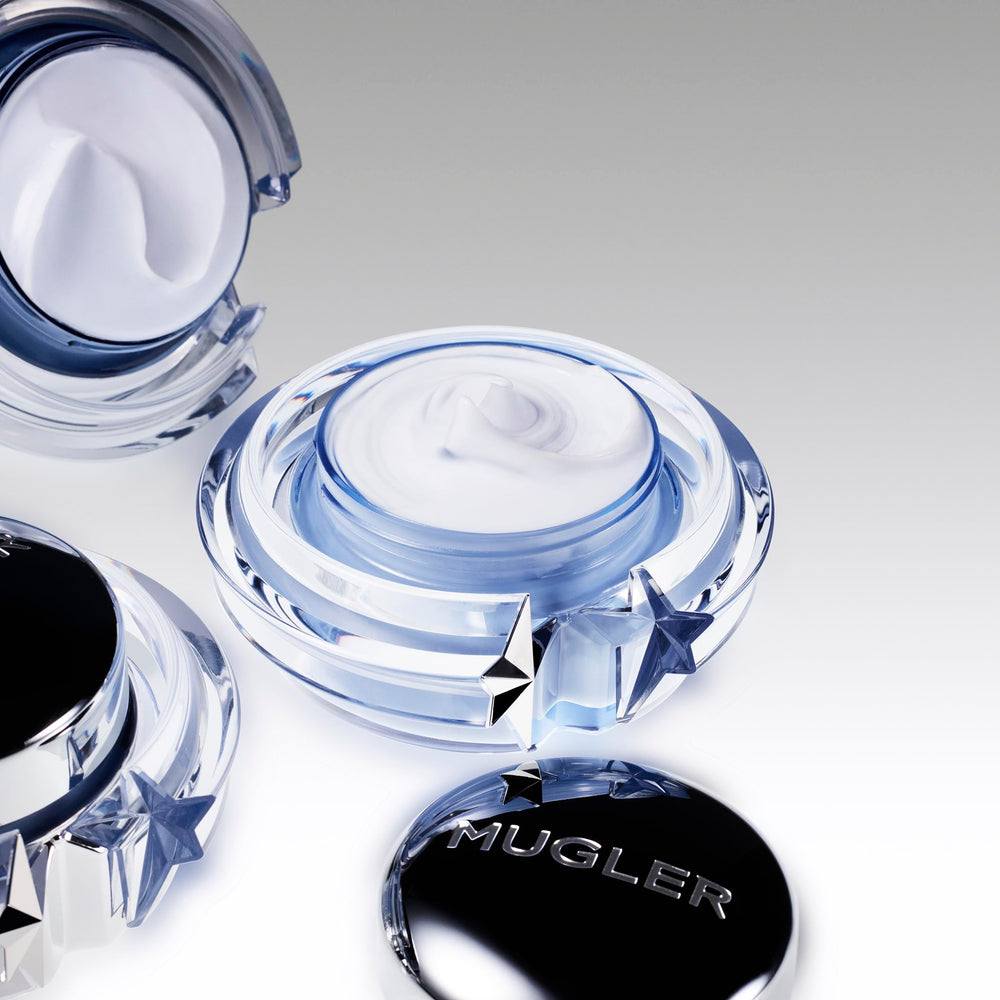 Mugler Angel cream applied on hand demonstrating smooth absorption and softness