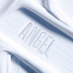 Mugler Angel cream texture close-up highlighting rich, hydrating consistency