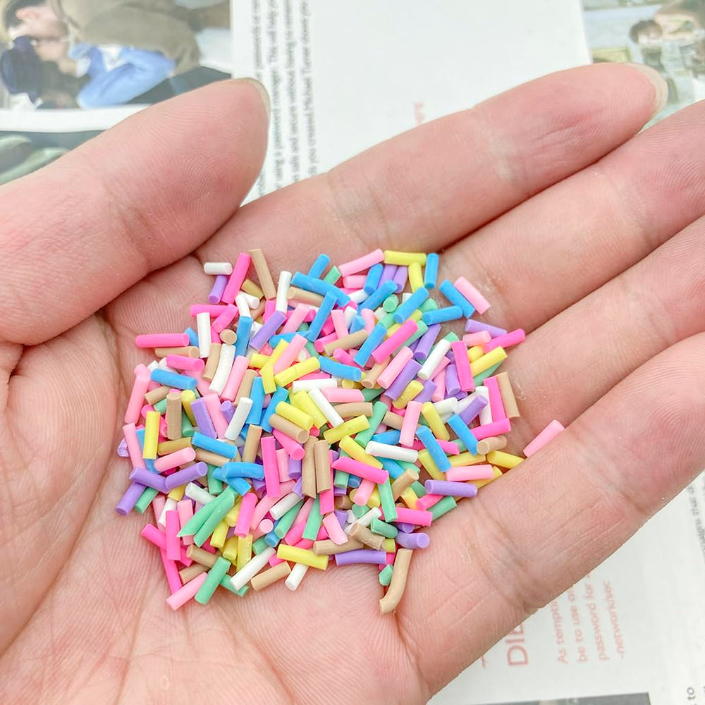 Mulutoo sprinkles applied to nails, adding playful color and texture