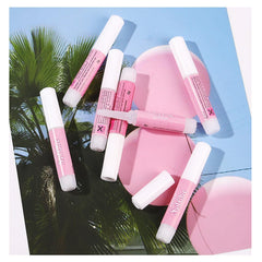 MUSILAN tube next to coin showing compact size and travel-friendly convenience