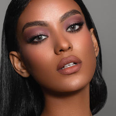 MYSTER ROSEY palette held in hand to show travel-friendly size advantage