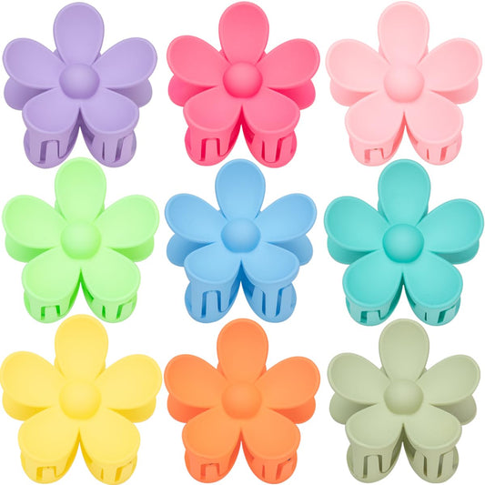 Mythos front packaging of nine matte flower claw clips, organized and travel-ready