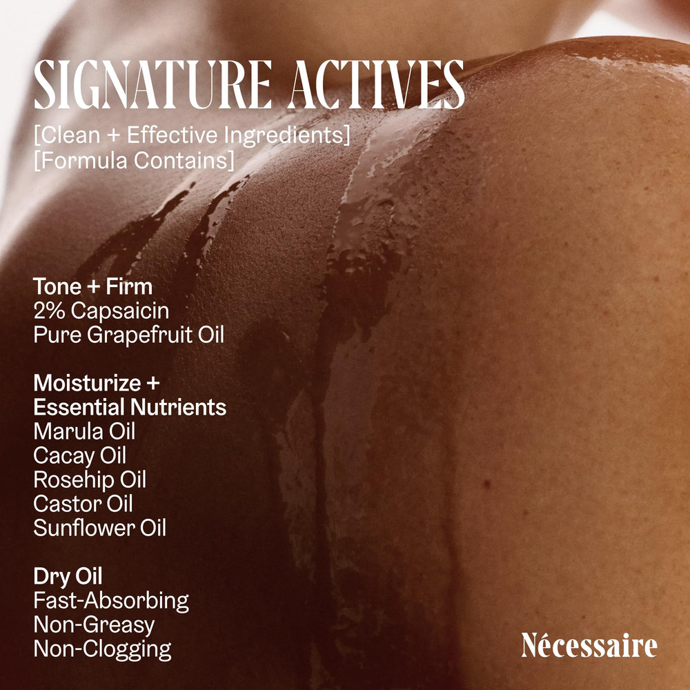 Applying Nécessaire body oil in hand to demonstrate smoothing and moisturizing benefit