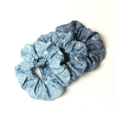 naibirdr scrunchies worn on wrist as accessory showing convenience and style