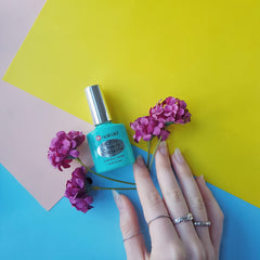 Nail-Aid on fingernail closeup showing smooth, quick-dry protective finish