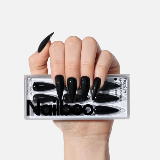 Nailboo front packaging showing Dark Dreams stiletto nails and included kit benefits