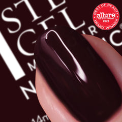 Nails Inc wide hugging brush close-up delivering precise, streak-free application benefit