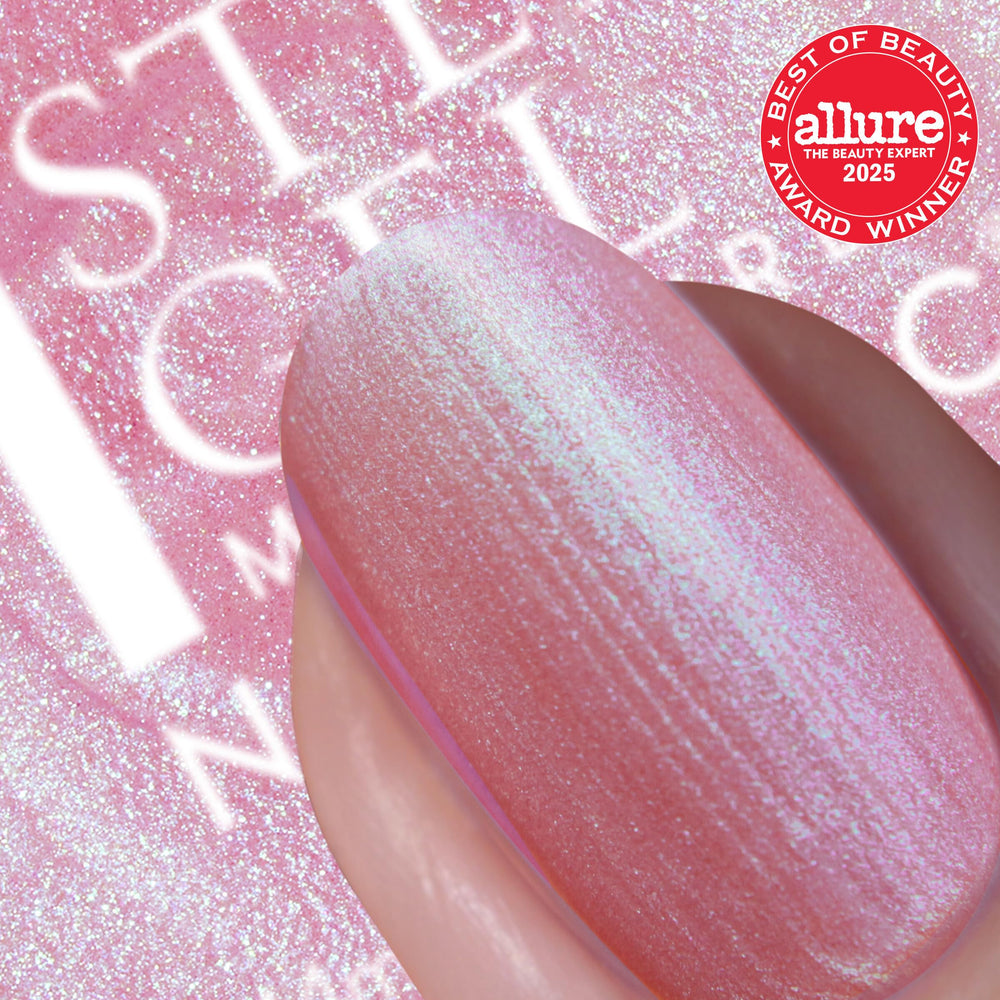 Nails Inc wide non-drip brush shown close-up for precise application