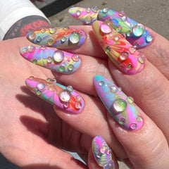 NAISKA stones used as face makeup accents, creates striking event-ready shine