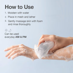 Naisture cleanser lather on palm showing gentle foam and cleansing action