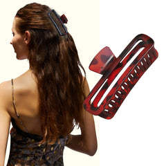 Nalodu red leopard clip styled in messy bun adding fashionable flair