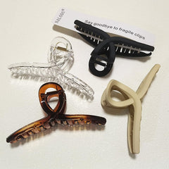 Nalodu front packaging showing four extra large matte jaw clips, quick selection benefit