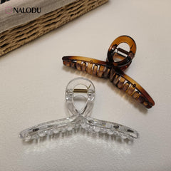 Nalodu clip holding thick curly hair, reliable no-slip hold benefit