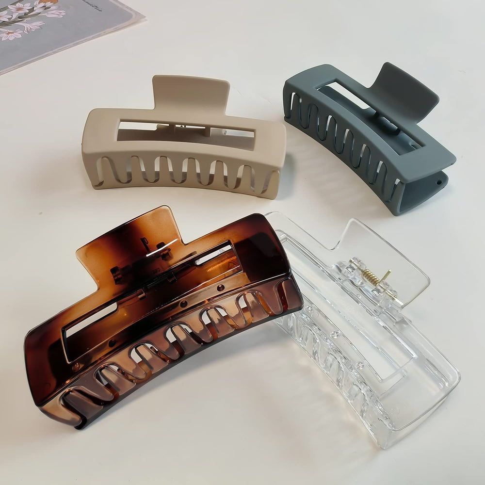 Nalodu clip held in hand to show 4-inch size and comfortable scale