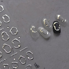 Namrec stickers next to a fingernail for size comparison, shows precise fit