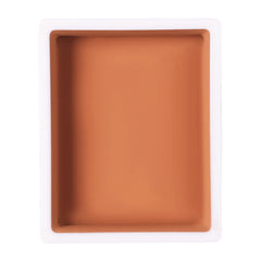 Narrative Cosmetics warm tone pan next to a coin illustrating compact travel-ready size
