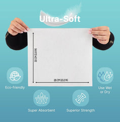 Nat.&Co. stacked towels edge view conveying thickness and absorbency