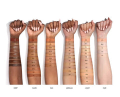 Natasha Denona concealer in use under eye demonstrating coverage benefit: natural brightening