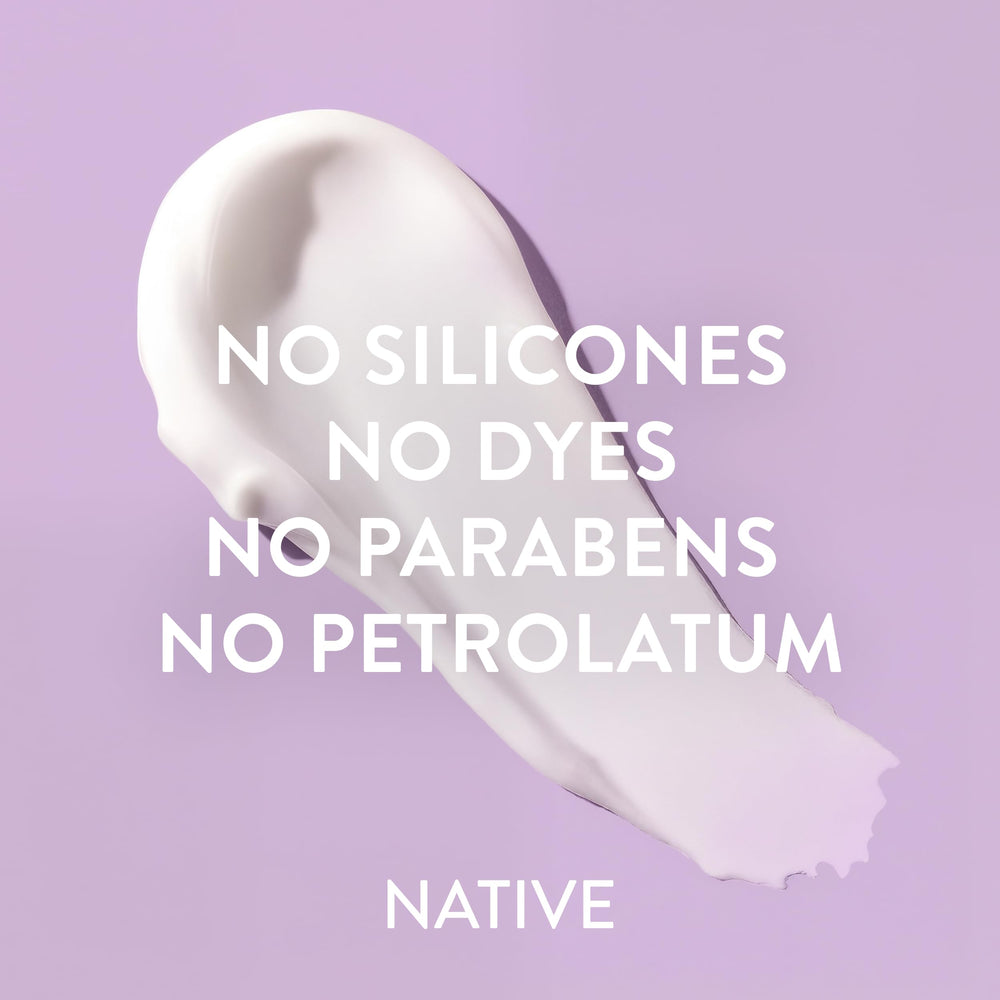 Native bottle next to a hand showing 16.5 fl oz size and scale