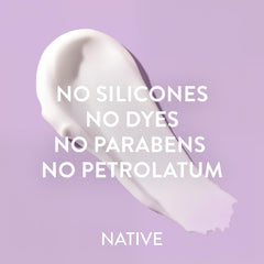 Native bottle next to a hand showing 16.5 fl oz size and scale