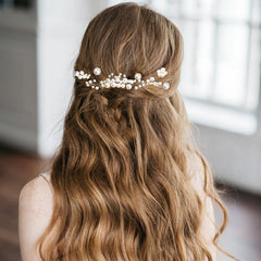 Naturahand in-hair bridal updo demonstrating secure hold and elegant finishing touch