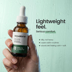 natural outcome applying oil to face with fingertips, promotes hydrated finish