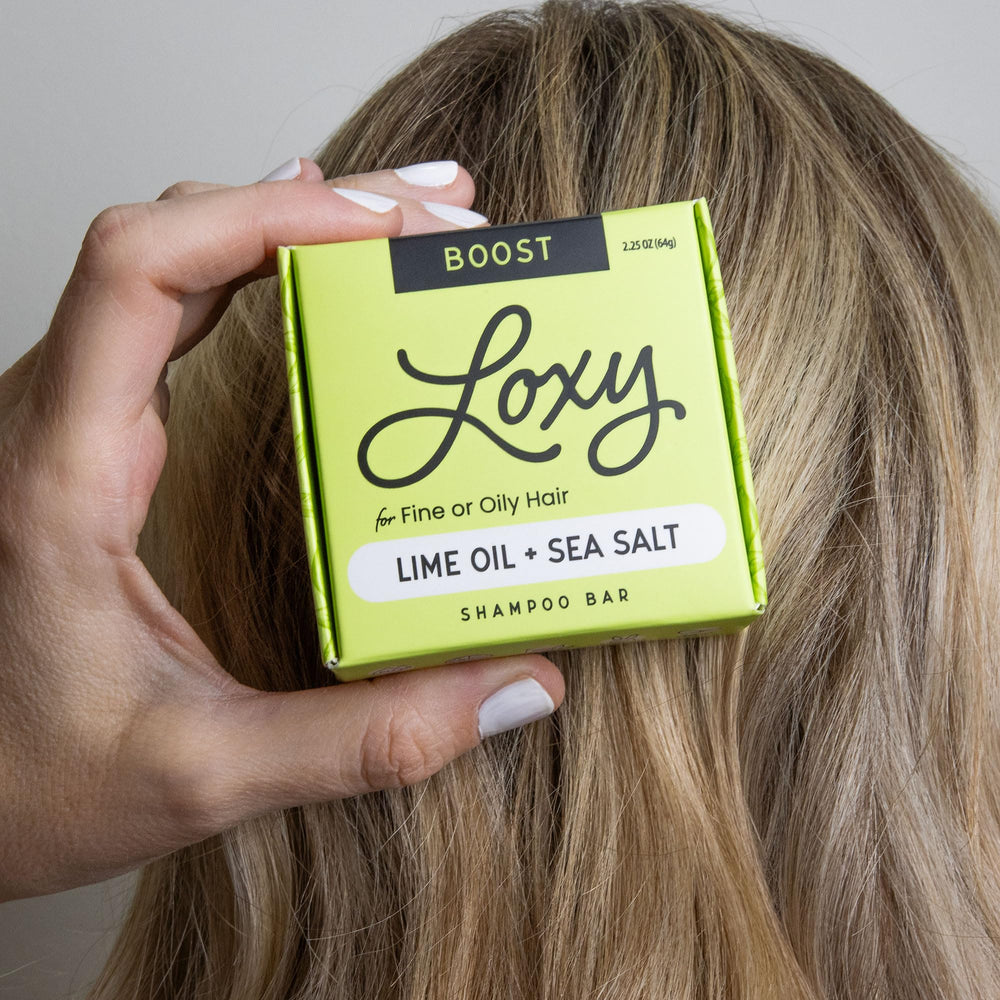 NATURÉL Loxy Boost with lime and litsea oils highlighting fresh scent and shine