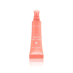 Naturium Phyto-Glow Lip Balm in hand lifestyle shot showing travel-ready balm for soft lips