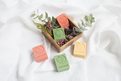 Naturtint bar resting on draining soap dish to extend product lifespan