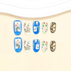 NBNTGH flat lay of 24 nails adhesive tabs and wooden stick for easy application