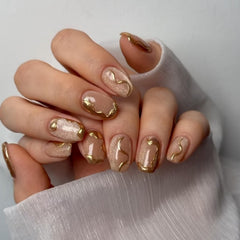 NBNTGH front packaging showing 24-piece gold press-on nails for instant manicure