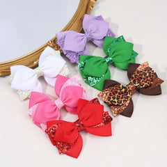 NCMAMA flat lay of several clips showing variety and gift-ready appeal