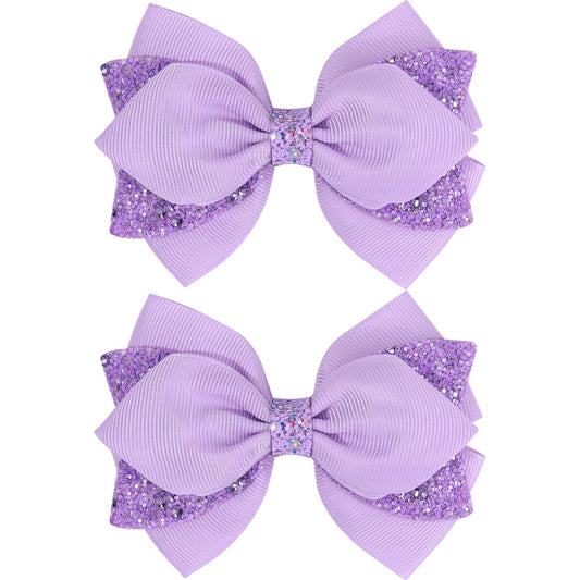 NCMAMA front view of purple sequin bow showing boutique style and shine
