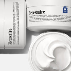 Nécessaire dispensing cream from pump demonstrating easy application