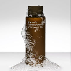 Nécessaire shampoo lather texture close-up showing gentle foaming action