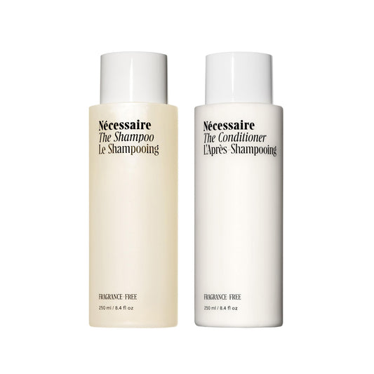 Nécessaire front packaging showing both full-size bottles and benefits