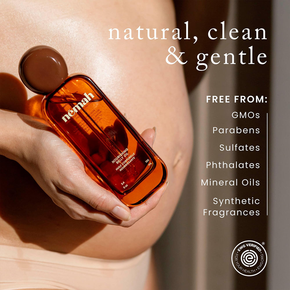 Nemah applied on pregnant belly demonstrating smooth, non-greasy feel