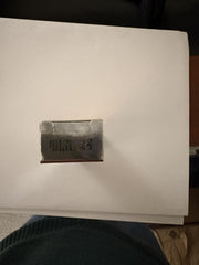 Neoprosone on bathroom vanity staged with towel suggesting daily routine convenience