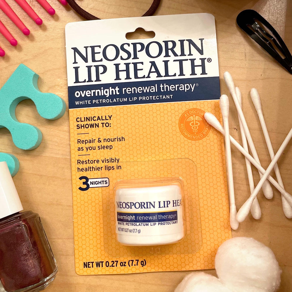 Neosporin in a travel pouch demonstrating portability and on-the-go use