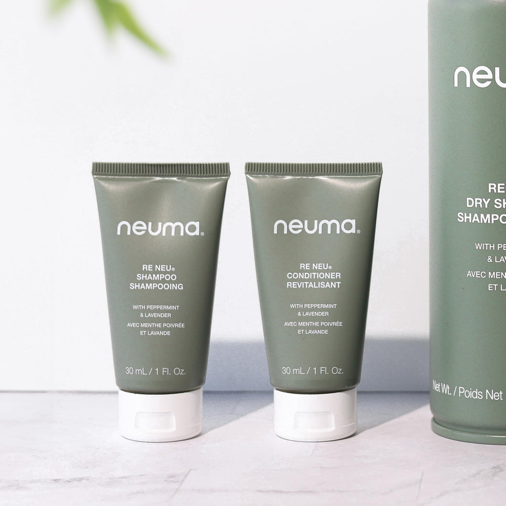 NEUMA bottle staged in bathroom for sustainable lifestyle appeal