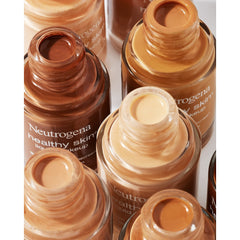 Neutrogena foundation split-face before and after showing visibly evened skin tone