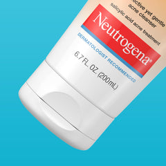 Neutrogena bottle in hand for size comparison showing travel-friendly scale