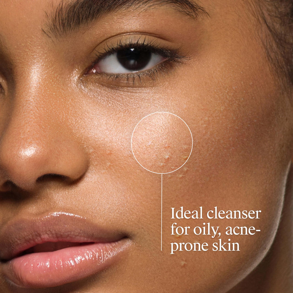 Person using Neutrogena cleanser washing face to reduce breakouts