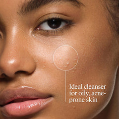 Person using Neutrogena cleanser washing face to reduce breakouts