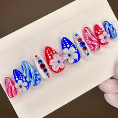 NEWSPIED front packaging showing full 24-piece patriotic nail set and accessories for quick application